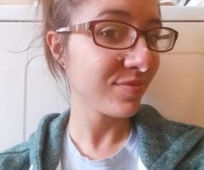 Chick wearing glasses with cum on face