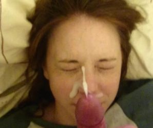 Cutie with cum on her face while her eyes are closed