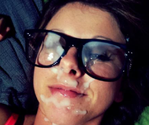 Chick with big glasses is coated in sperm