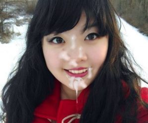 Cute Asian in the snow with facial