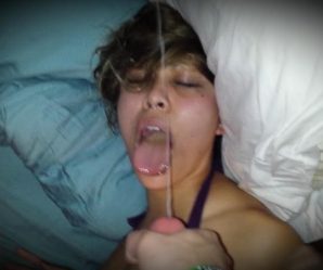 Chick with her tongue out trying to catch cum