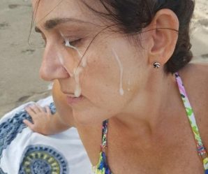 Milf enjoying cum facial at beach