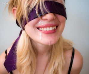 Blindfolded cutie enjoys cum