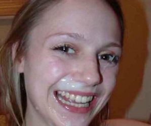 Brunette has a big smile on her face after cum facial