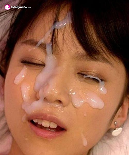 Cute Asian girl has a face full of cum