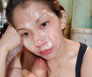 Lovely Asian babe posing with cum facial