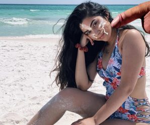 Pretty babe at the beach cum faked