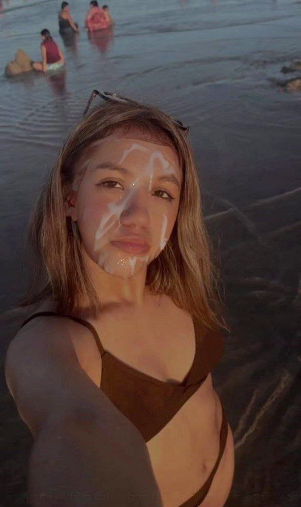Pretty girl cum selfie at beach