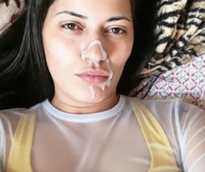 Beautiful lady laying down with cum on her face